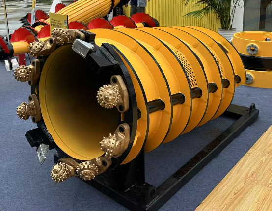 Self-cleaning Core Barrel with Roller Bits